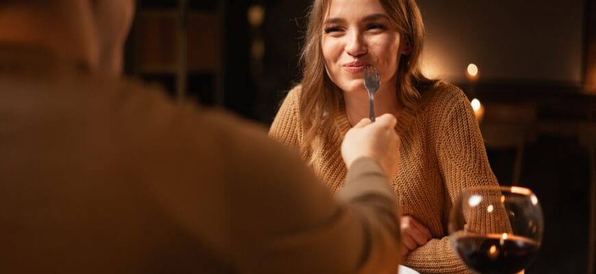 Happy,Couple,Having,Romantic,Dinner,In,Restaurant,,Eating,And,Drinking
